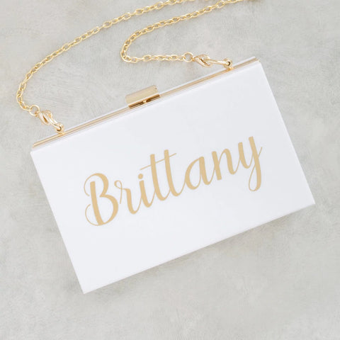 A thank your bridesmaids gift in the form of a personalized clutch bag