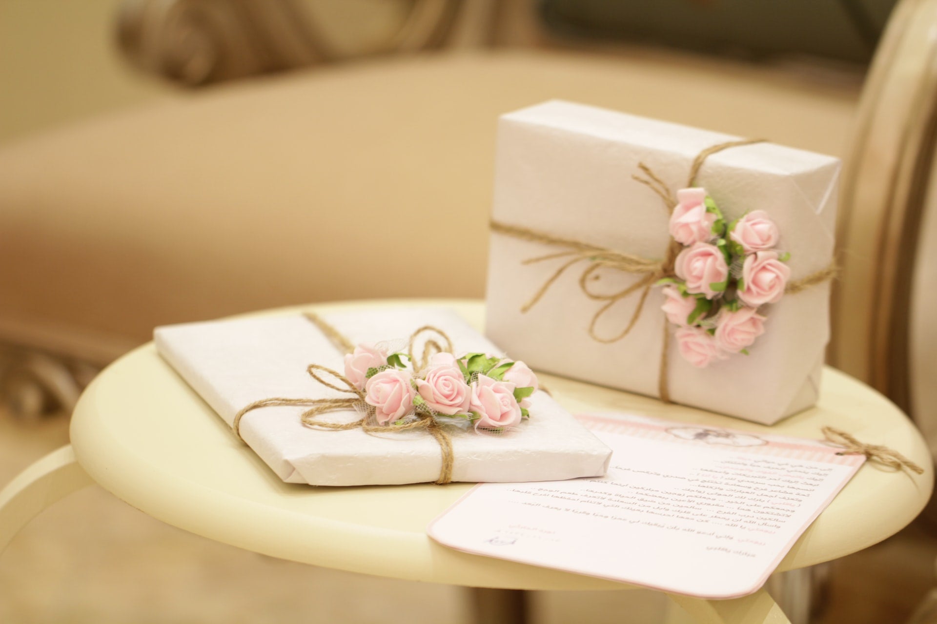 Wrapped gifts with twine and flowers