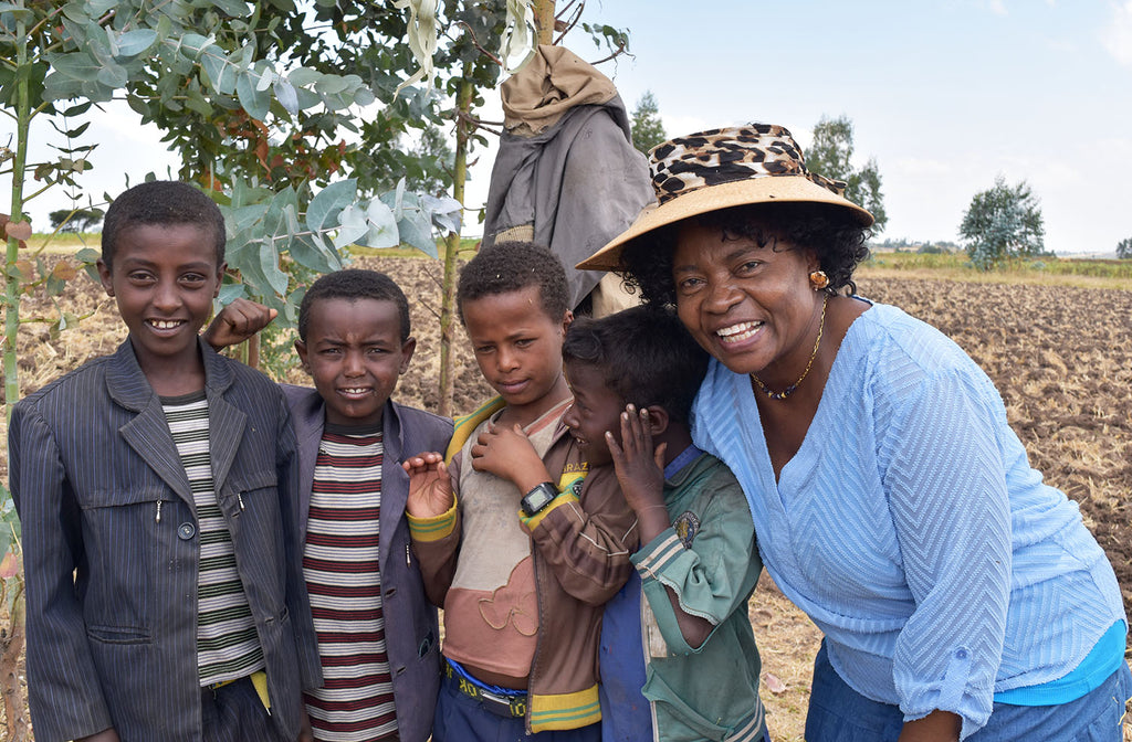 Professor Ruth Oniango with children in Ethiopia