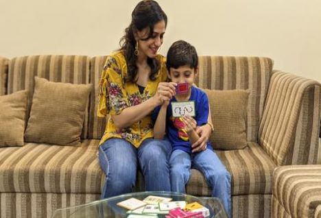 Mother and Child Playing Board game