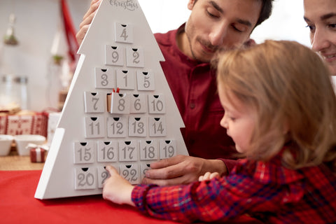 Parents enjoying activity with child