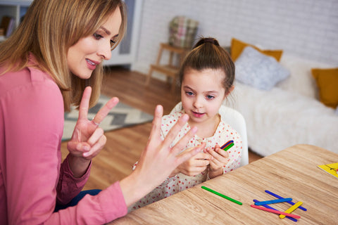 Girl learning to count