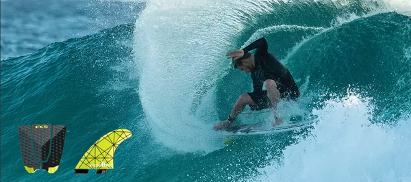 FCS Surfer Kolohe Andino with FCS fins and tail pad