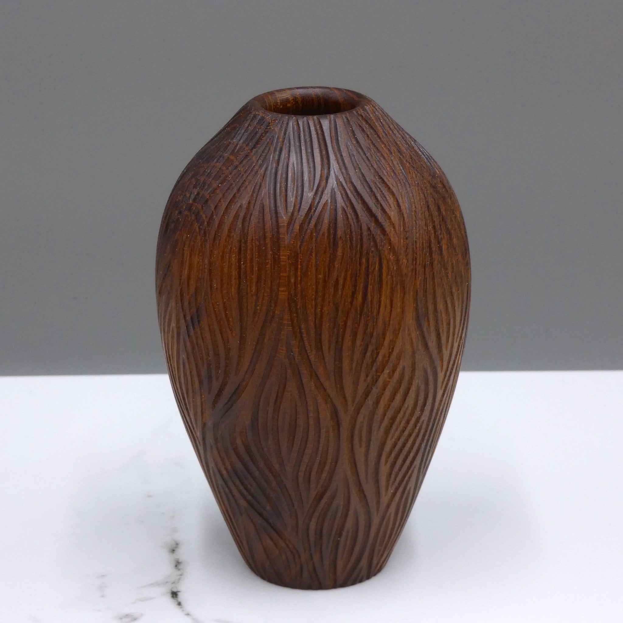Carved laburnum vase by woodturner Howard Moody