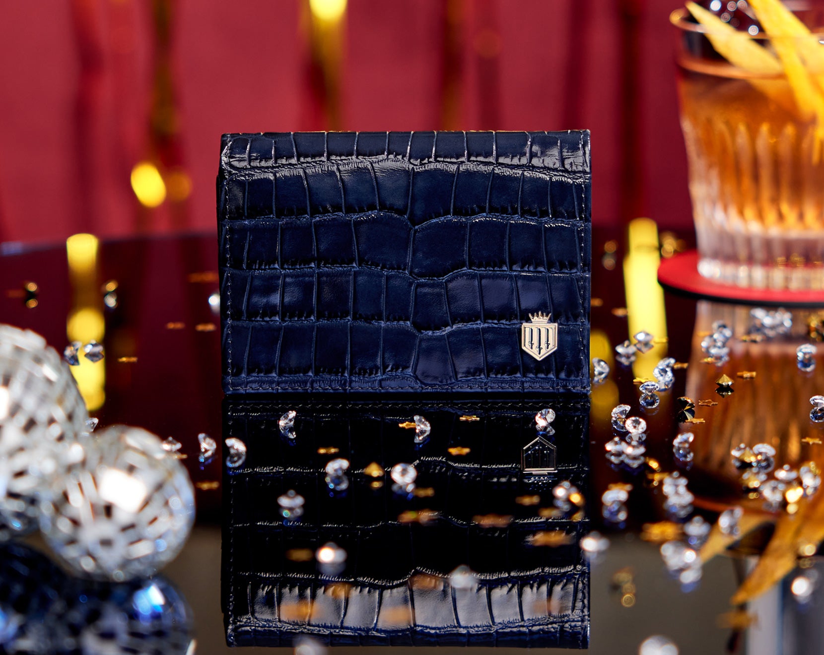 The Ashwell Unisex purse on a table covered in diamonds looking festive.