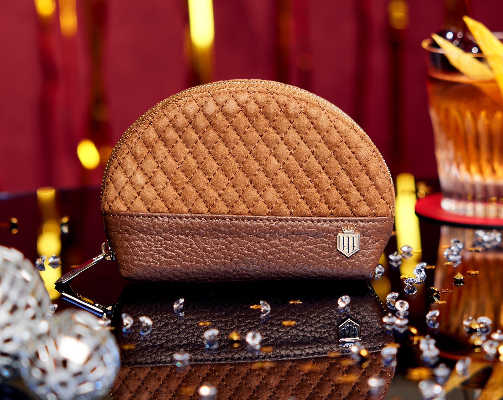 The chiltern coin purse on a table covered with diamonds in a festive setting.