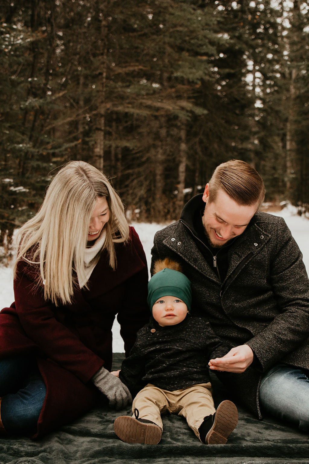 Image of mother, father and baby.