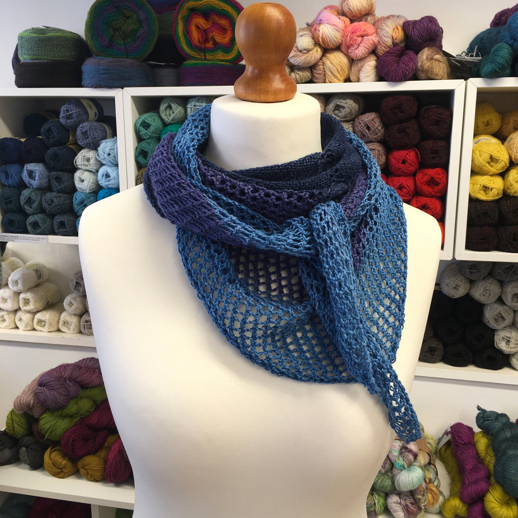 Cotton eyelet shawl wrapped and tied at neck