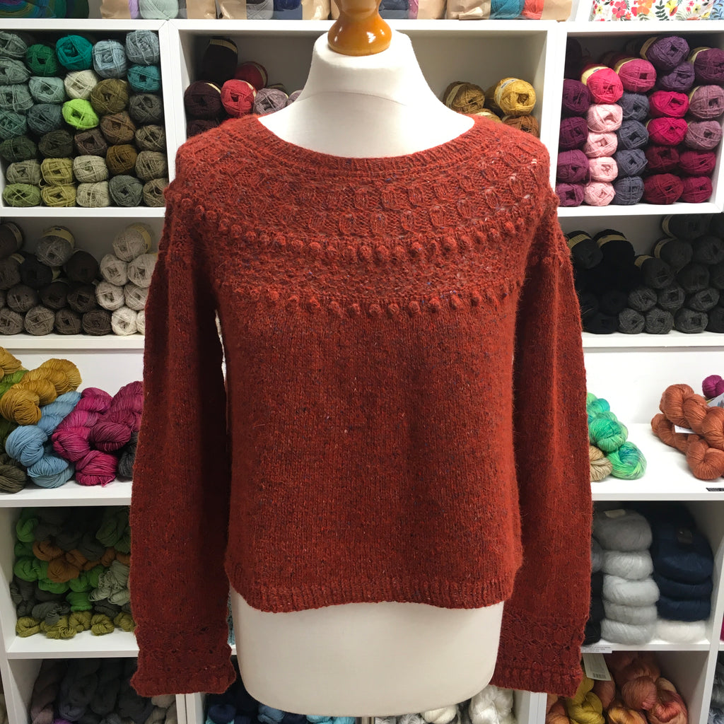 Dandelion round neck hand knitted sweater in orange Rowan Felted Tweed