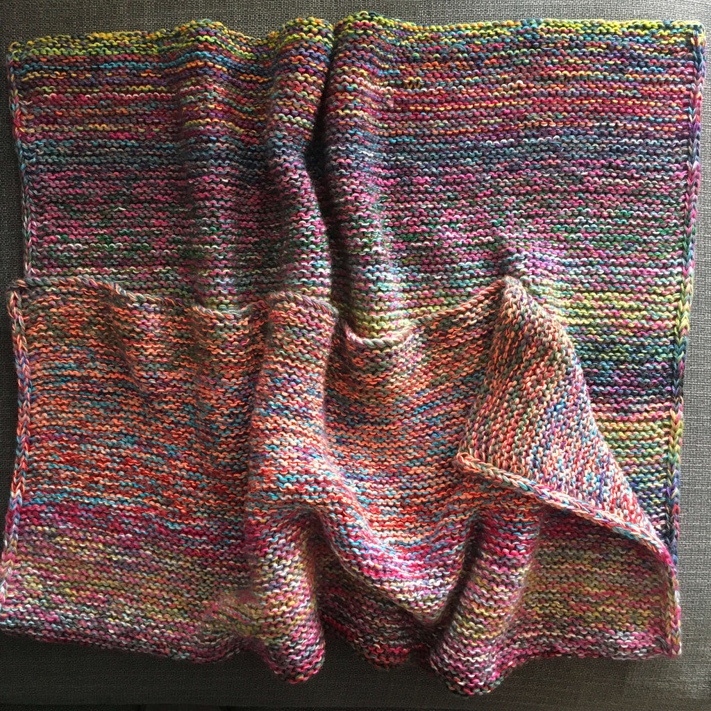 multicoloured scrappy knitted blanket