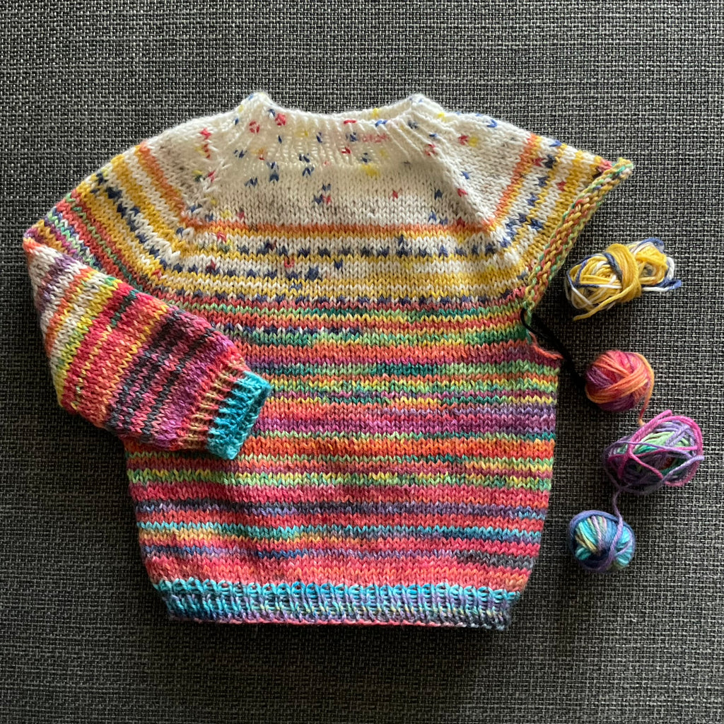 multicoloured baby jumper