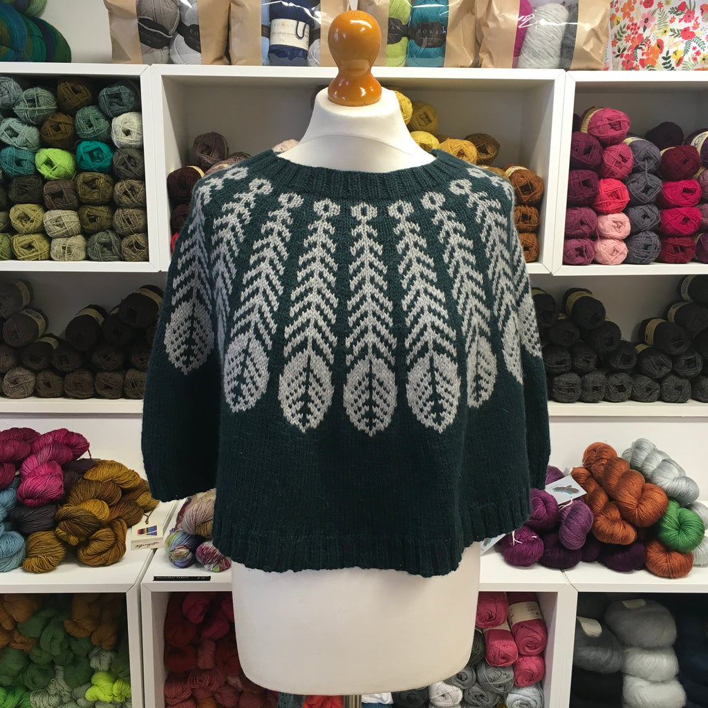 dark green blue handknit poncho with grey feather pattern