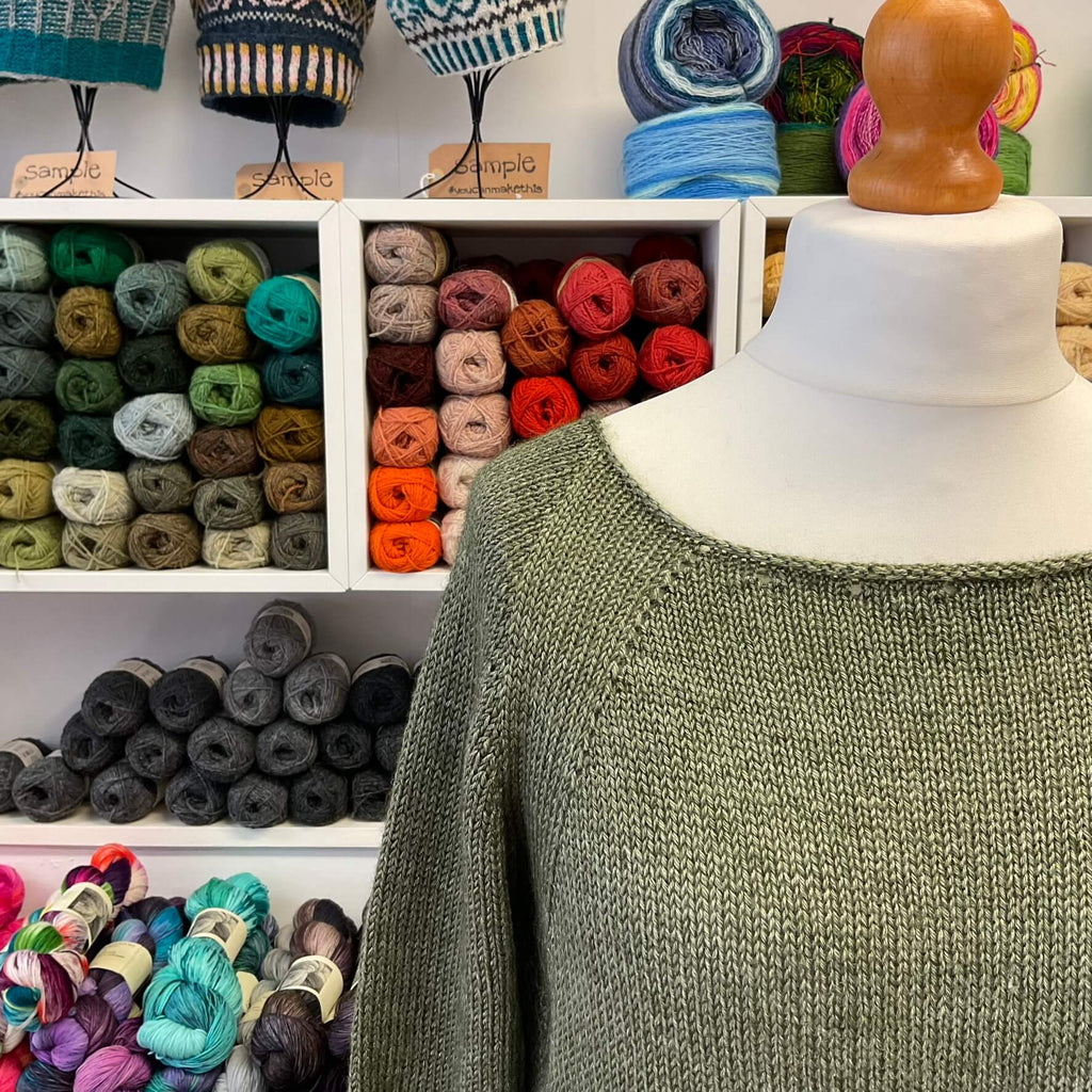 green sweater neckline