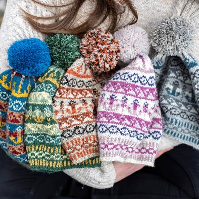 armful of hats