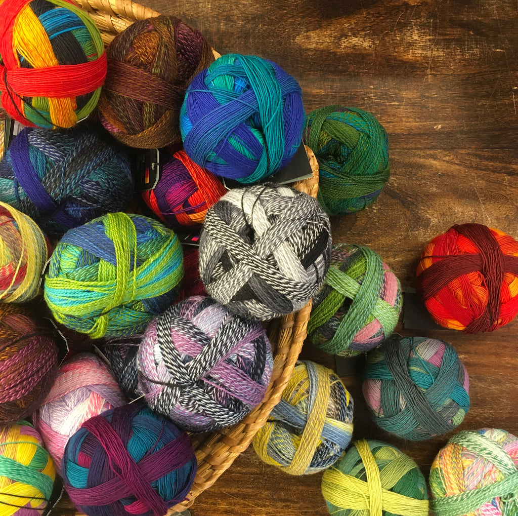 multicoloured balls of wool