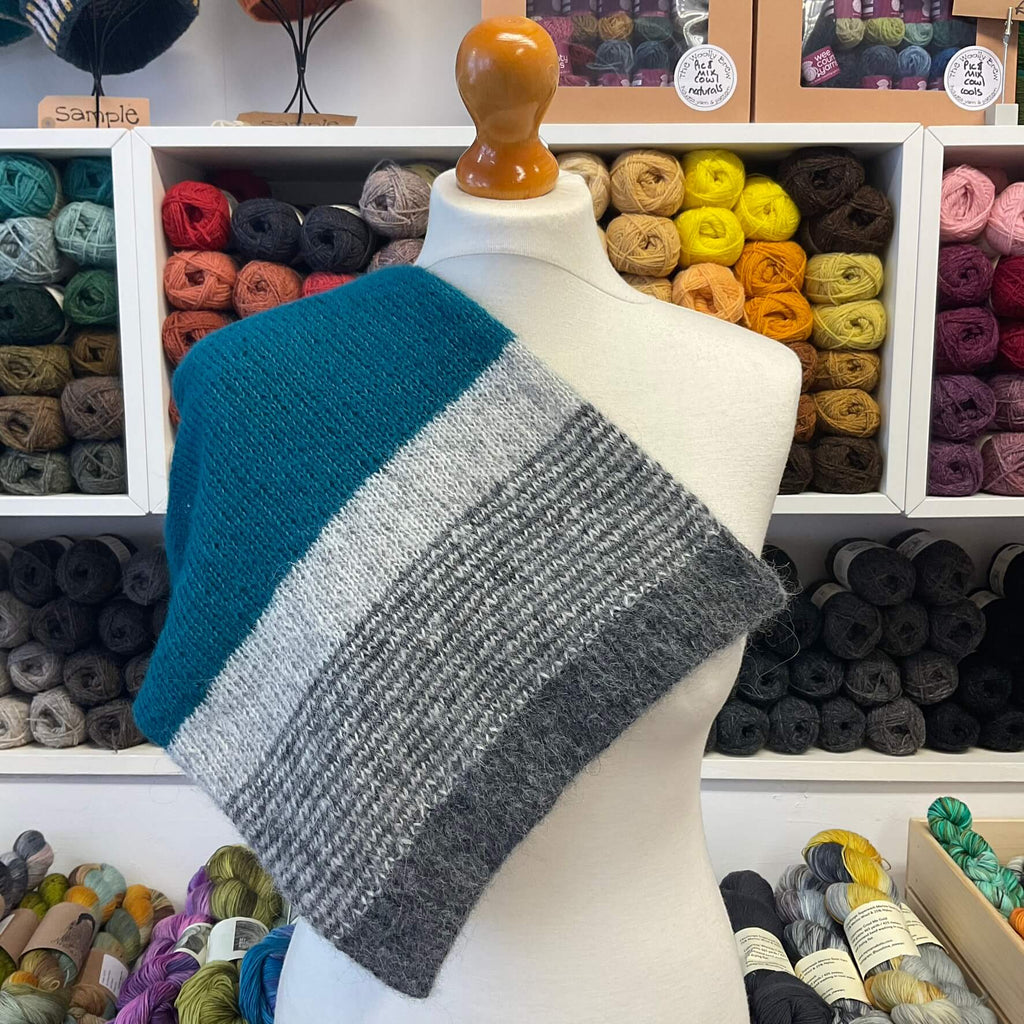grey and teal cowl