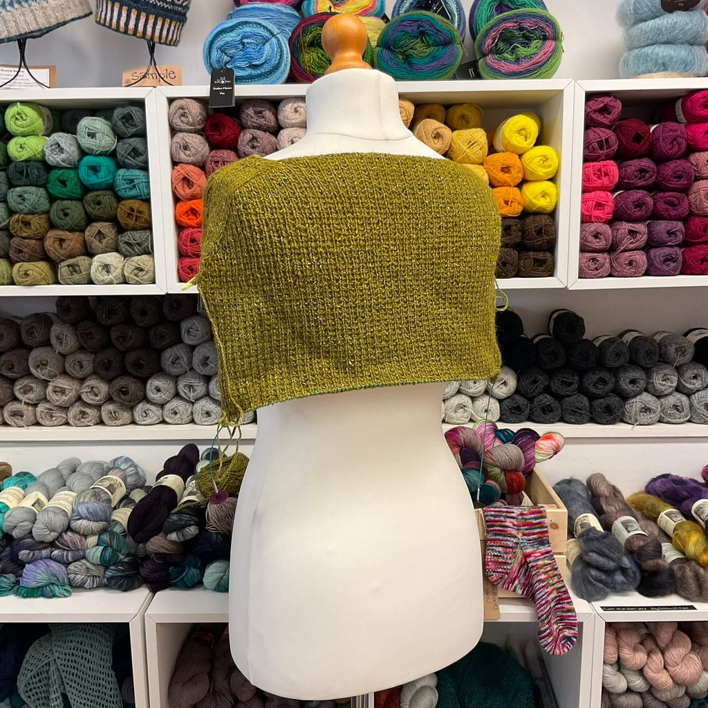 greeny yellow unfinished slipover on mannequin
