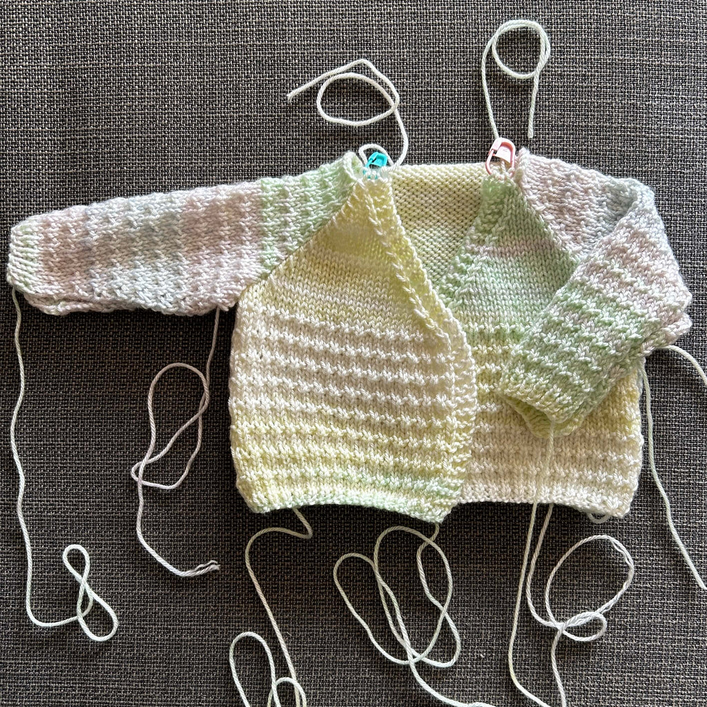 unfinished baby cardigan