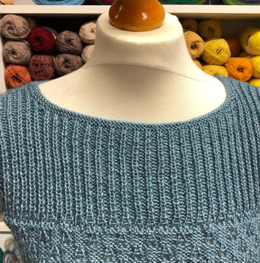 blue summery top on a mannequin