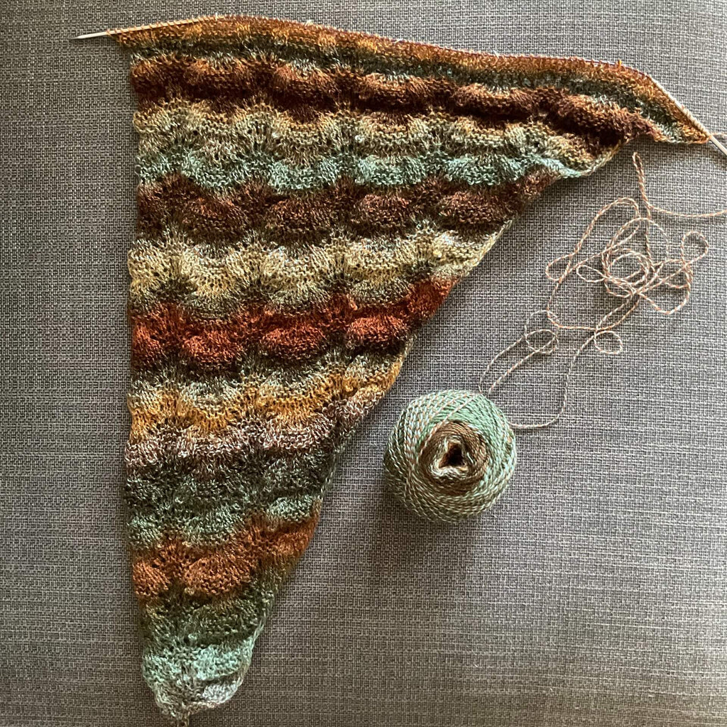 lace shawl in greens and browns