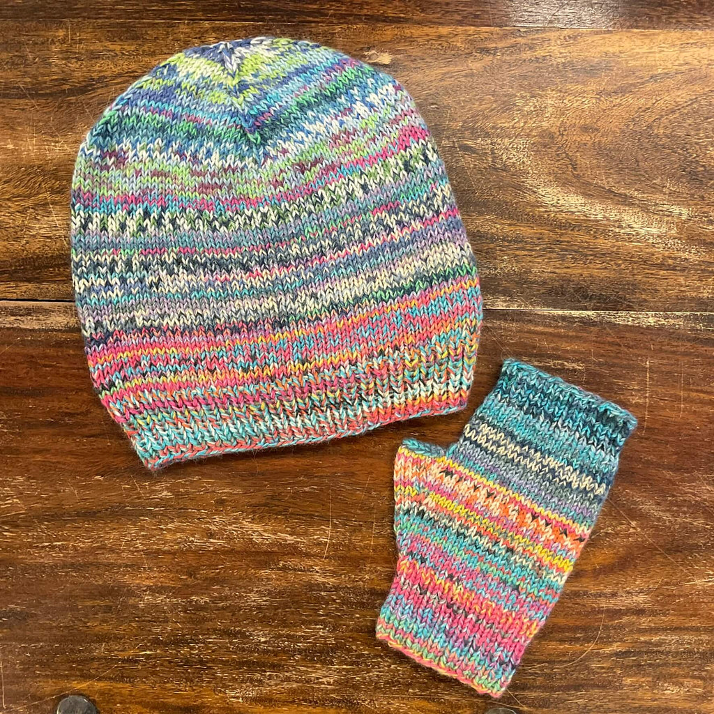 multicoloured hat and fingerless mitts at the woolly brew