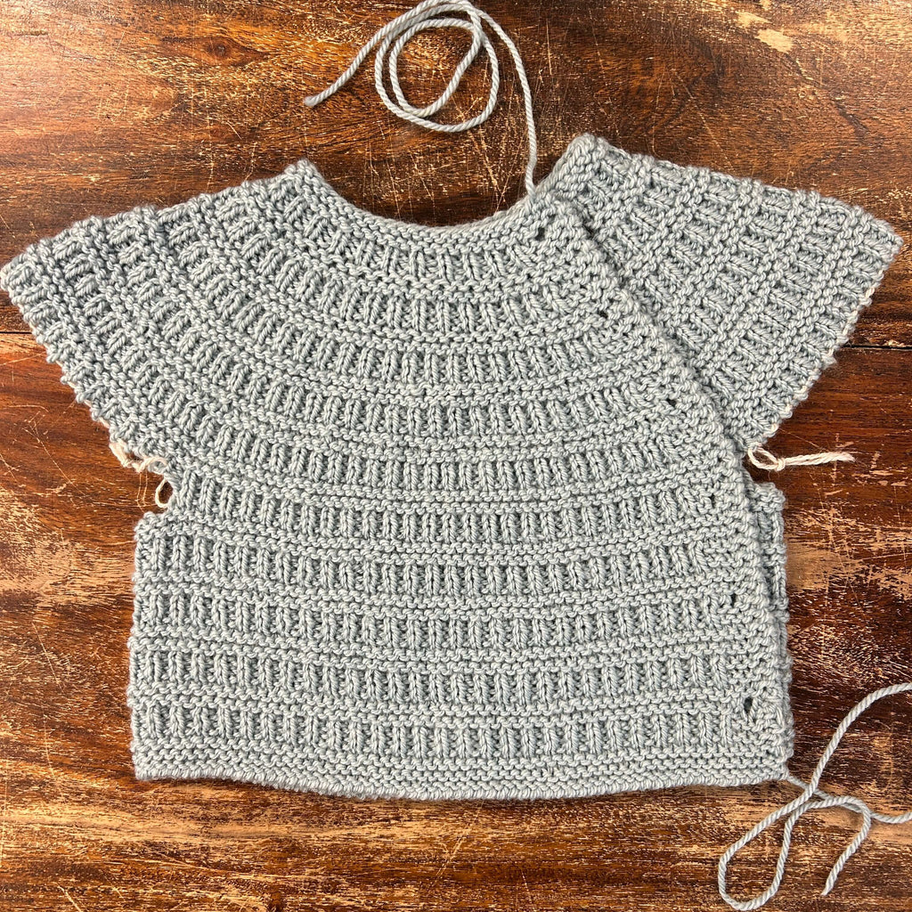 unfinished baby cardigan