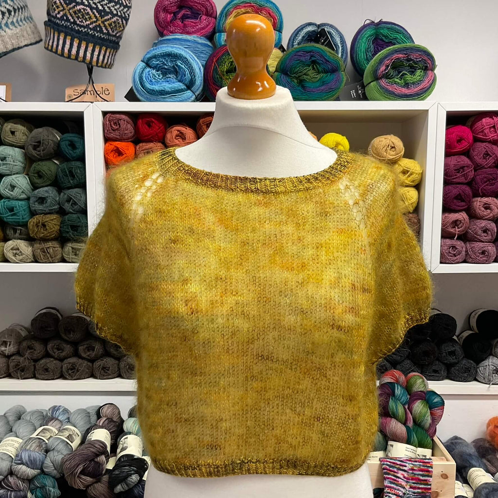 bright yellow green handknit tee shirt on mannequin 