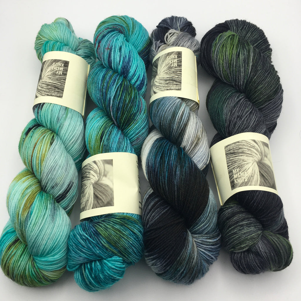 4 hanks of hand dyed yarn from turquoise to dark