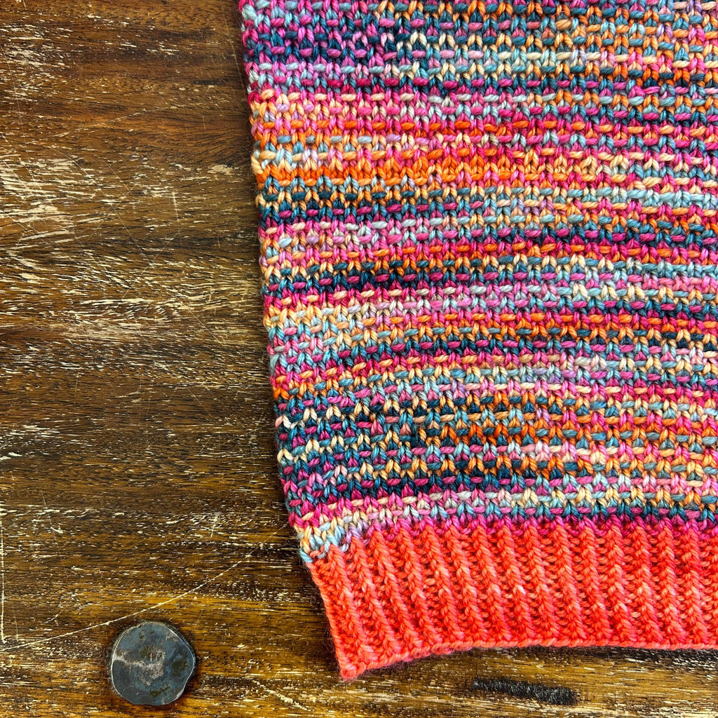 orange multi coloured cowl