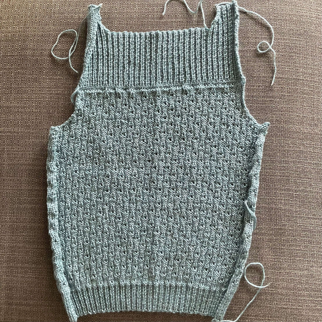 back of unfinished lacy vest top