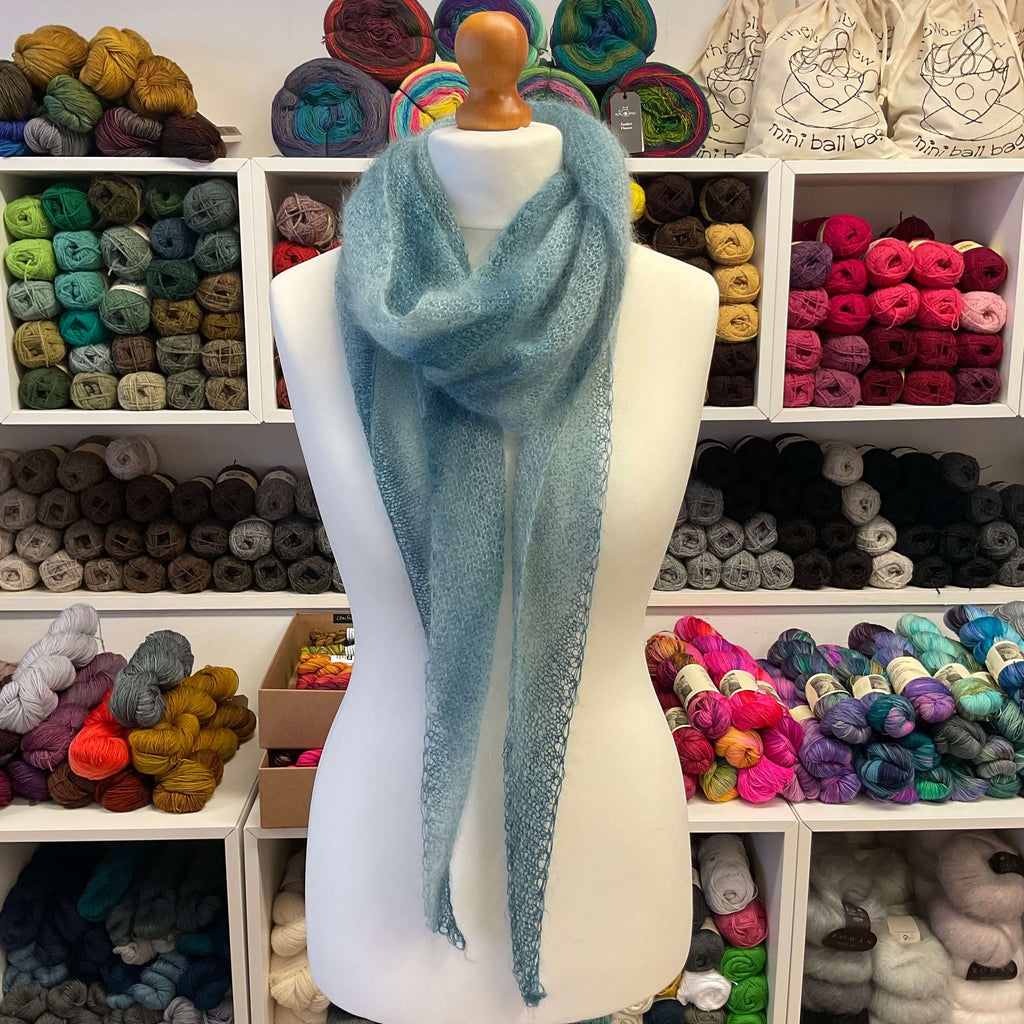 blue mohair scarf on mannequin