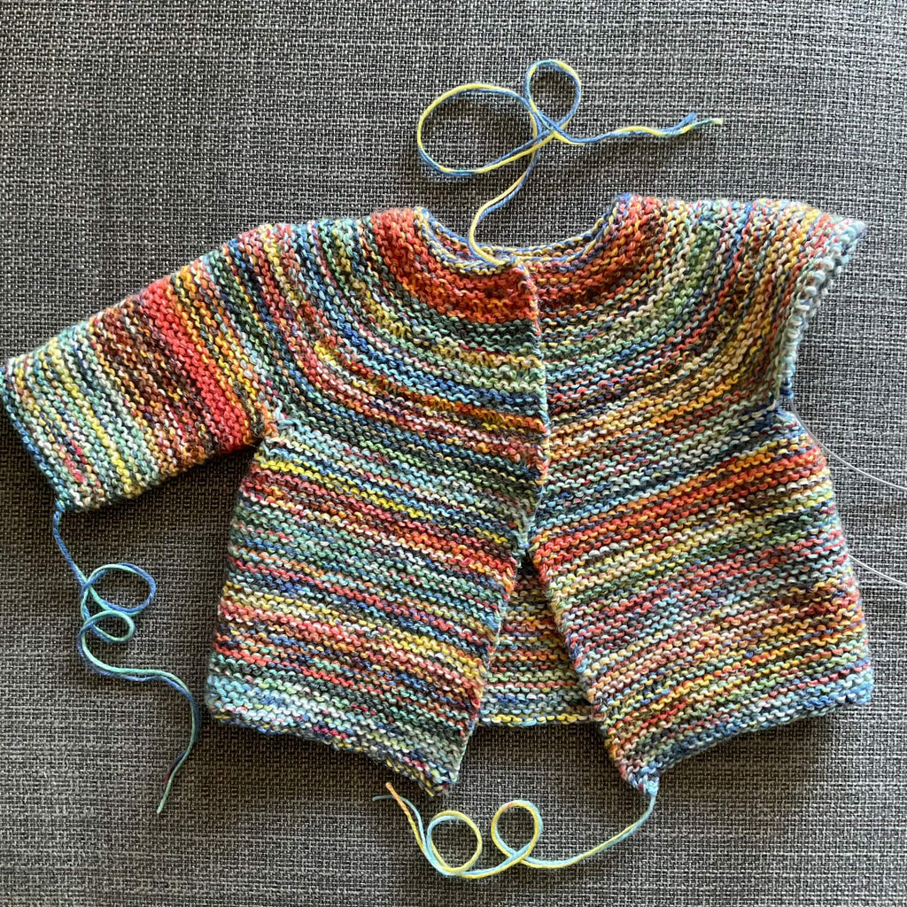 orange marled garter stitch baby cardigan