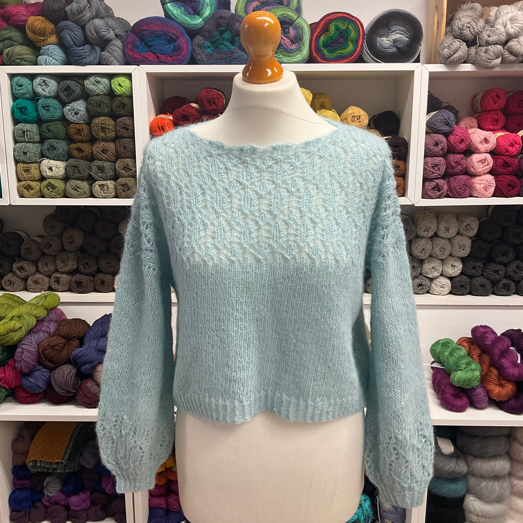 hand knit ice blue alpaca sweater with lace yoke and cuffs