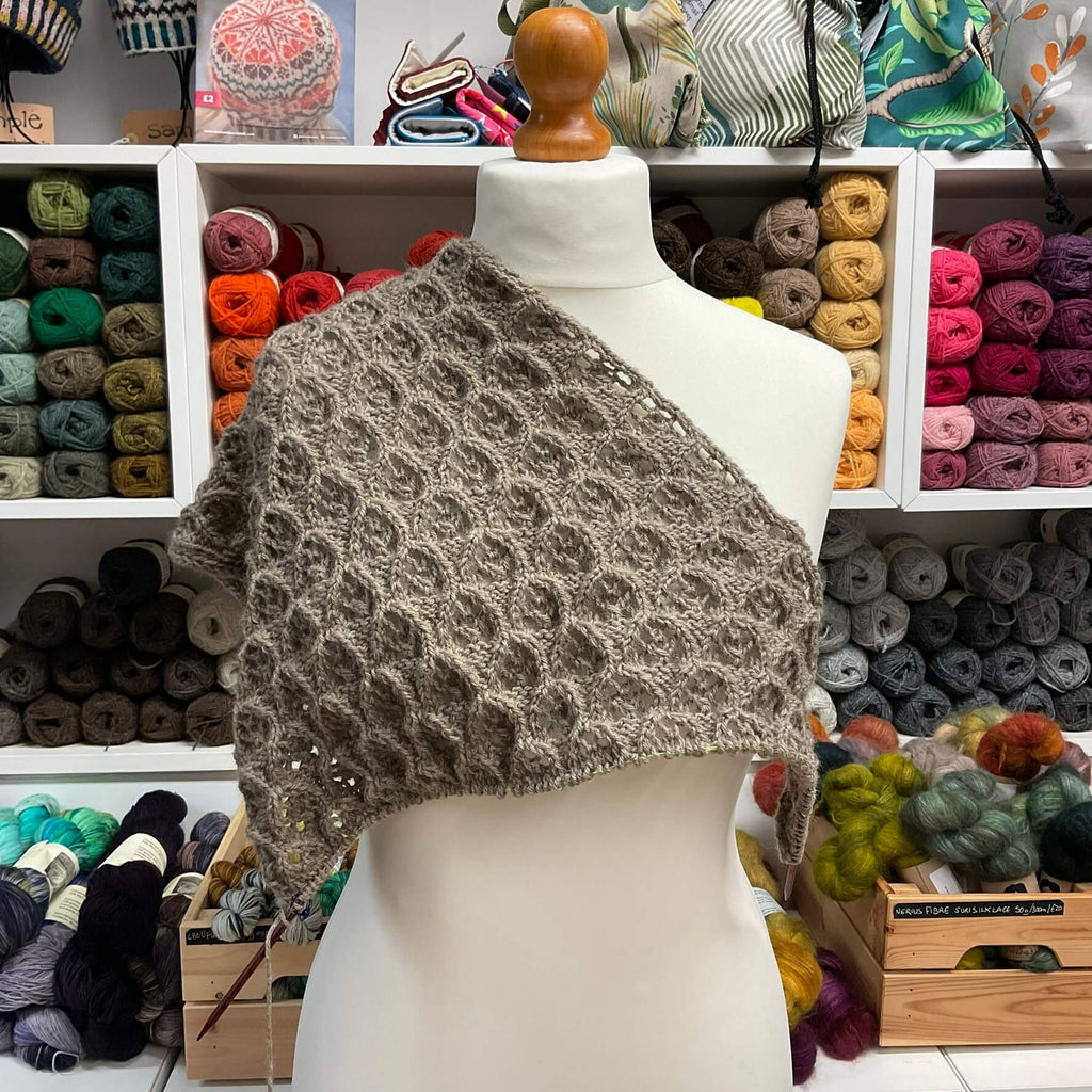 textured lace shawl on mannequin