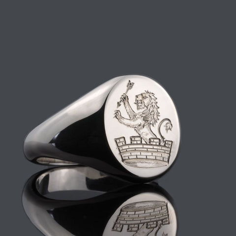 hand engraved lion family crest on sterling silver heavy oval signet ring