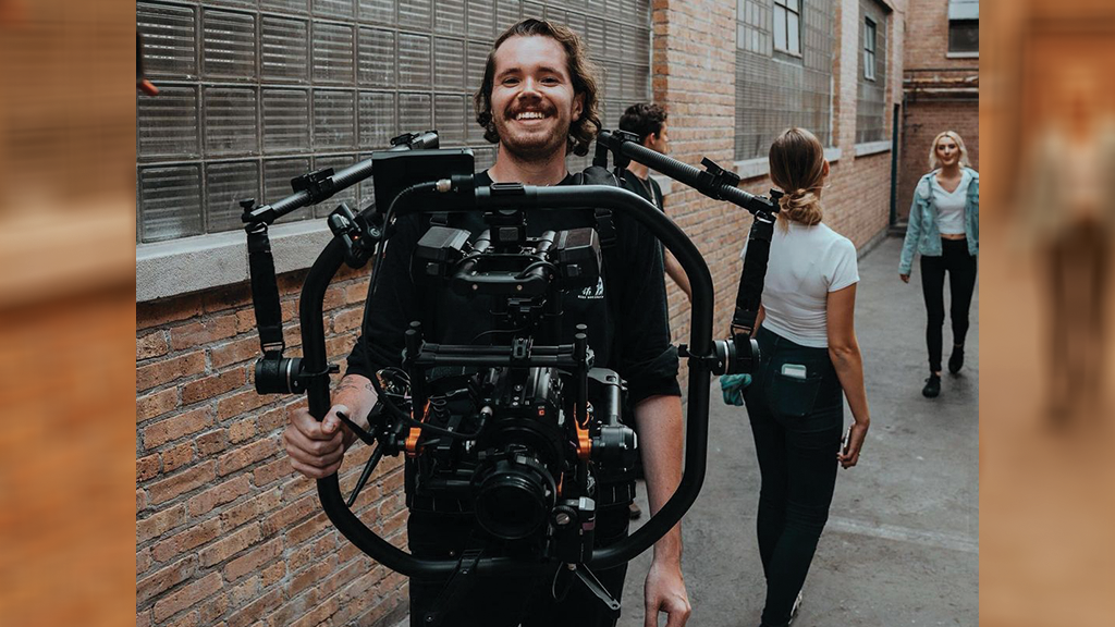 Austin Taylor of Midwest Movi on set with a Movi
