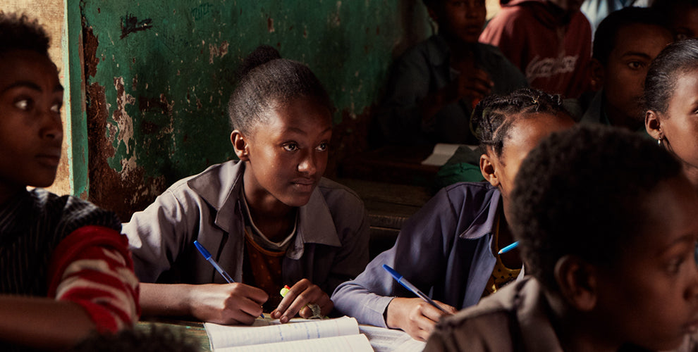 A group of students learning in a classroom in Ethiopia.