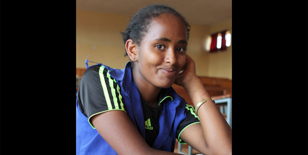 A headshot of Firehiwote, a student enrolled in the Girls Gotta Run Foundation. Image provided by: Falcon Coffees.