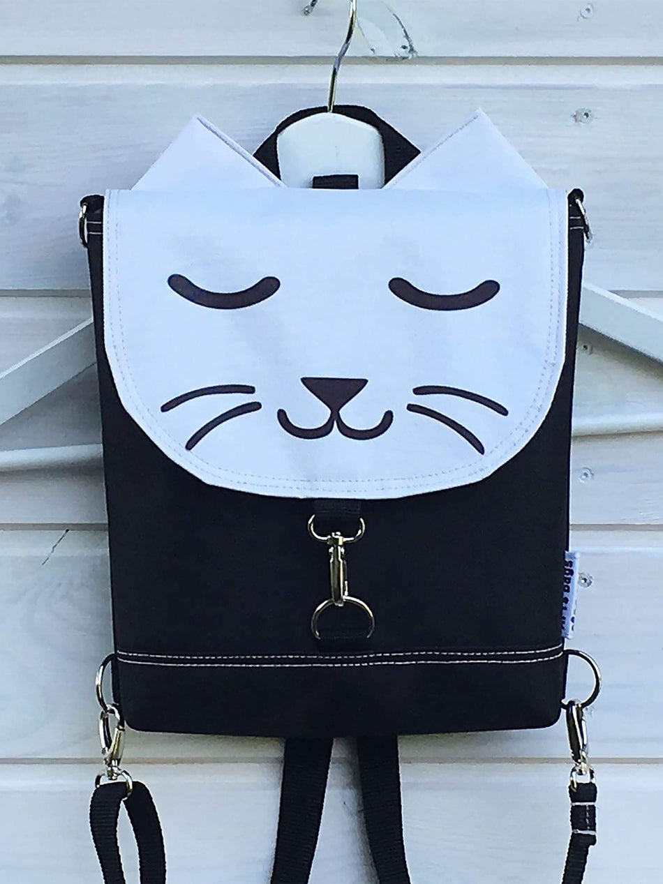 white cat backpack