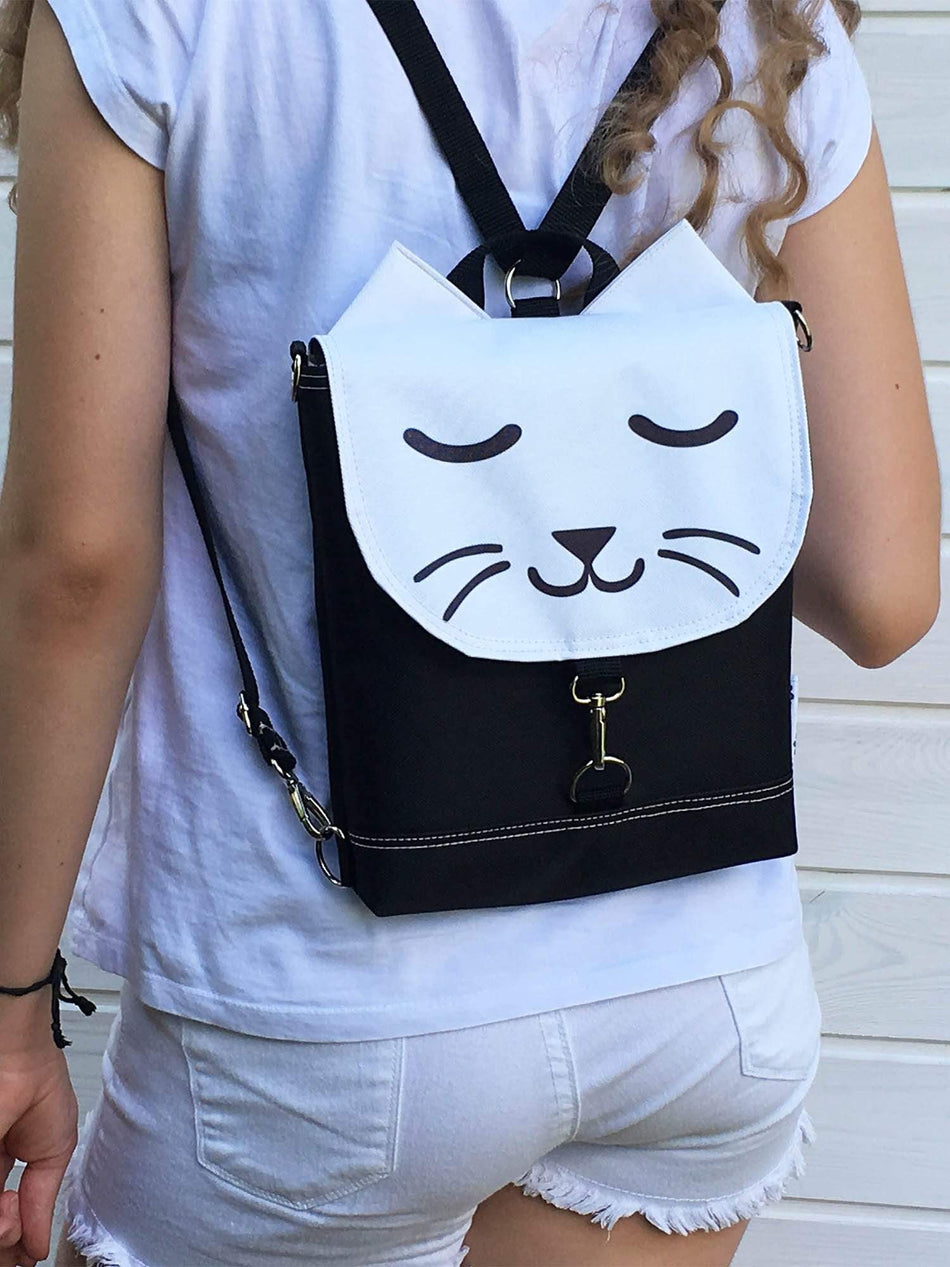 white cat backpack