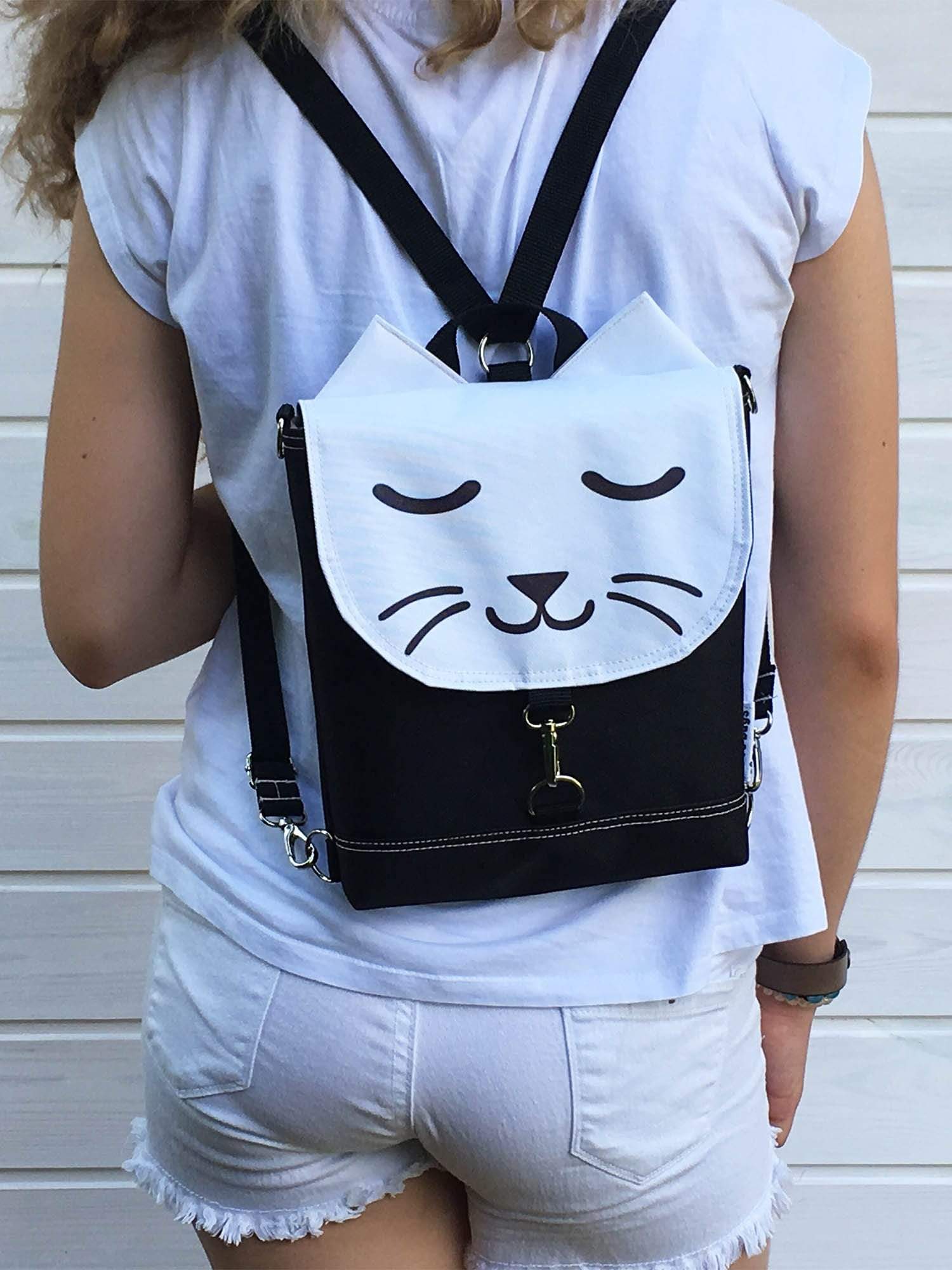 white cat backpack