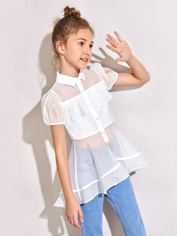 asymmetrical top with ruffles on the hem