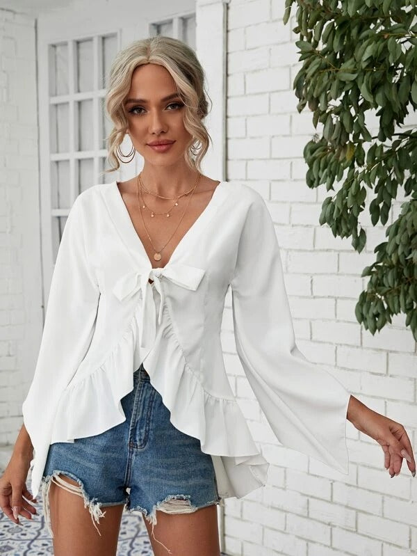 asymmetrical top with ruffles on the hem