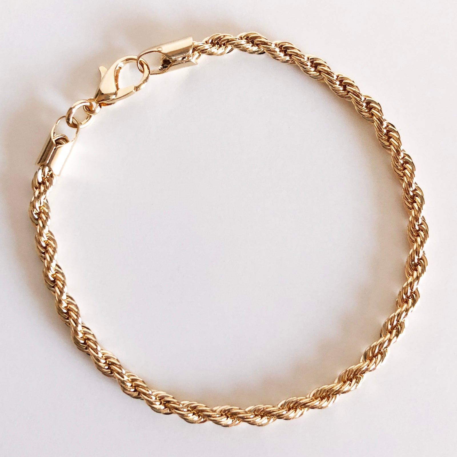 Gold rope chain bracelet with lobster clasp