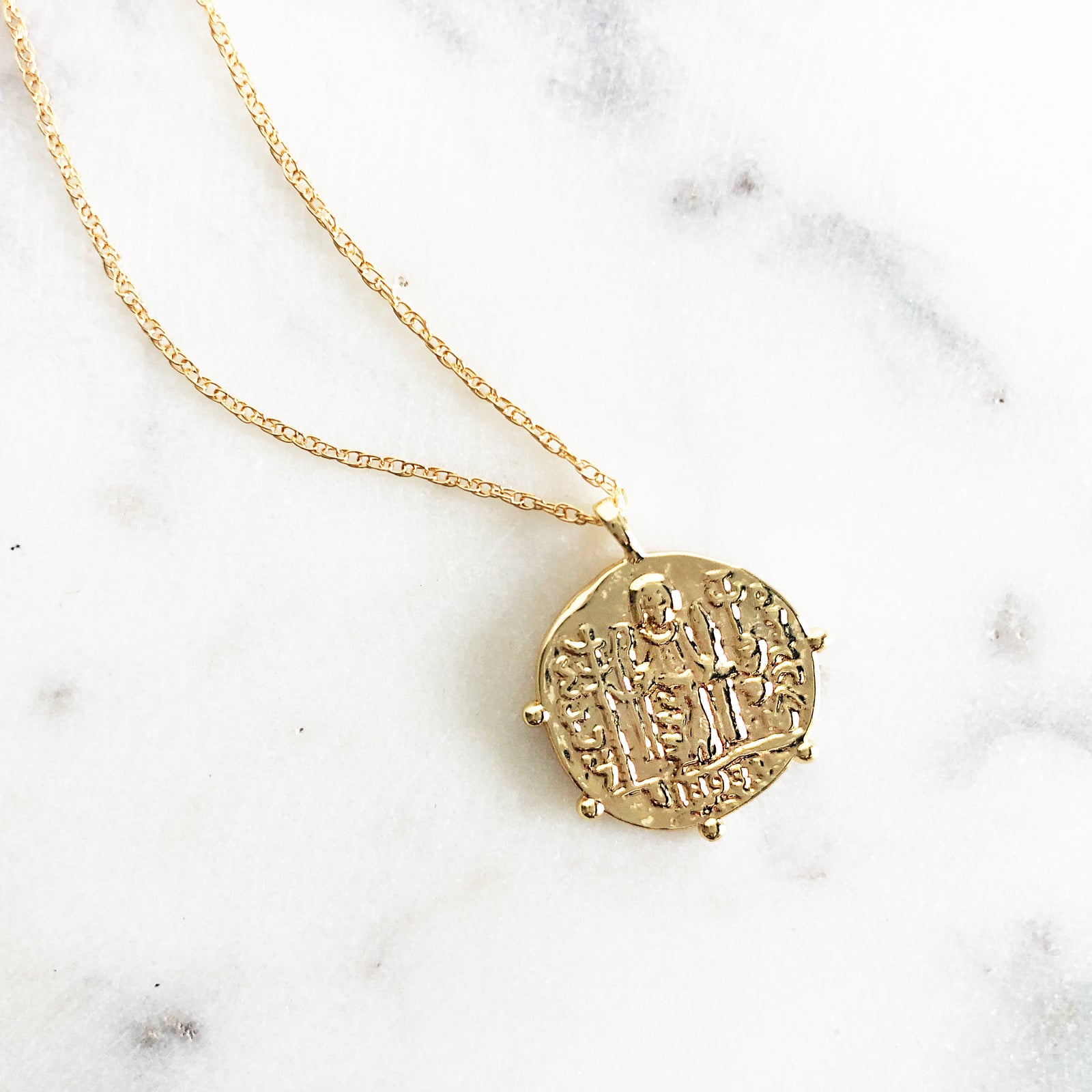 Gold pirate coin necklace