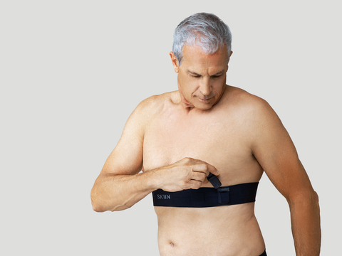 CVD patient using Myant Health Skiin Chest Band