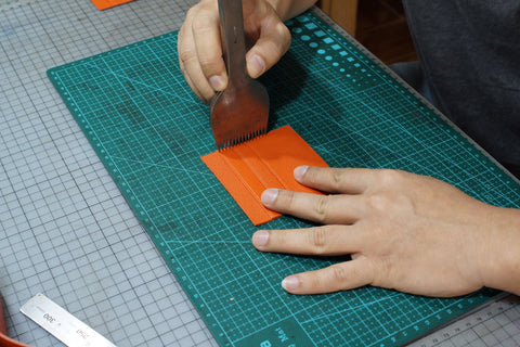 Wallet production method - seam hole punching