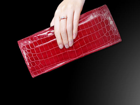 Dinner Party: At a dinner party or formal social occasion, a sophisticated and gorgeous crocodile leather clutch is a must-have. Choose a bag in a metallic tone, such as silver or gold, to add a touch of luxury and sparkle. Pair it with an evening gown or a sophisticated gown to create an elegant and classy look.