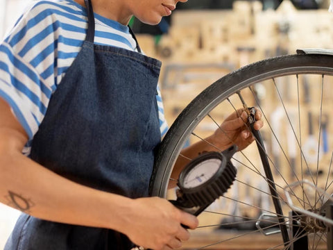 regularly checking bicycle tire pressure