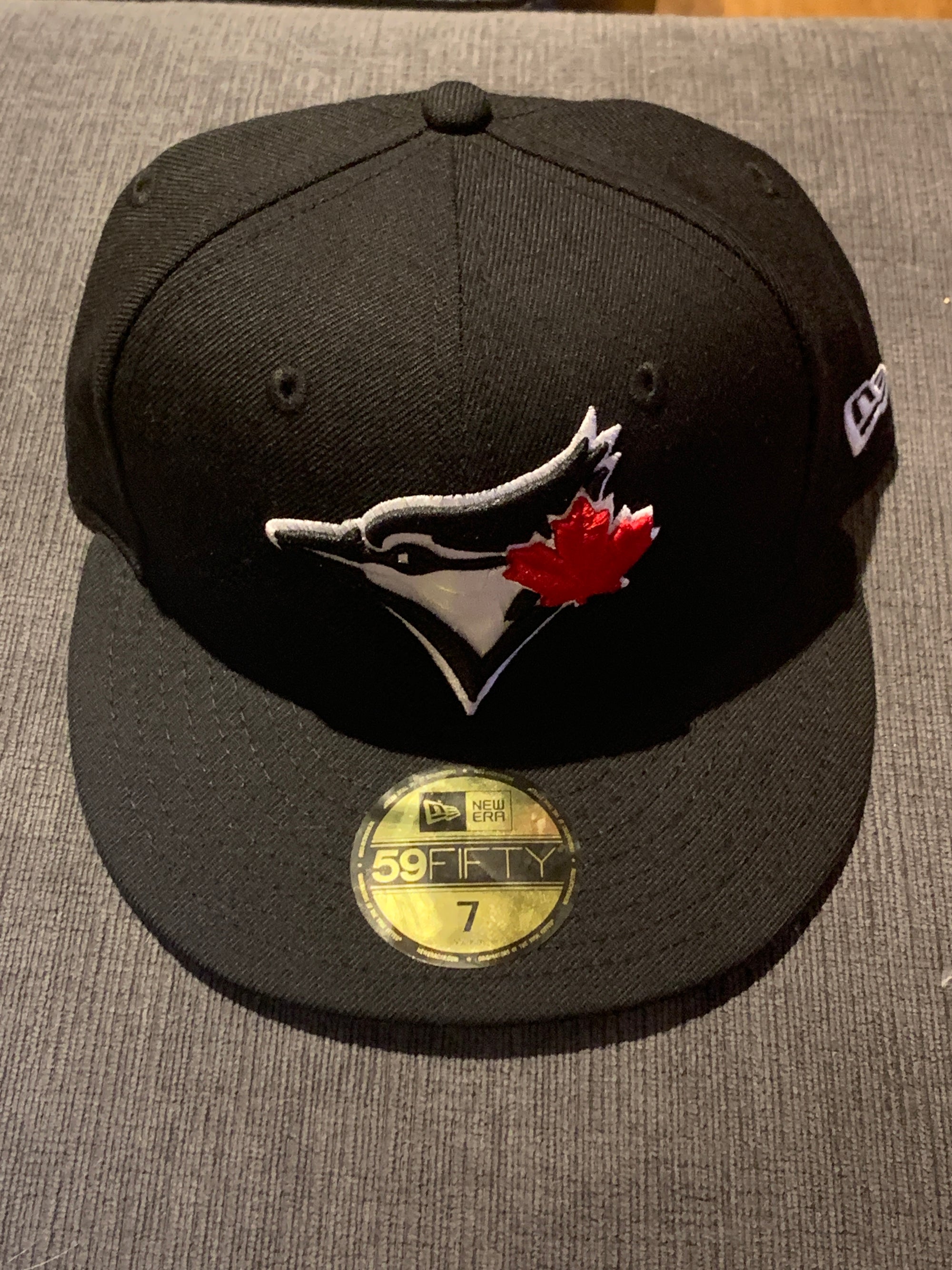 all black blue jays hat red leaf